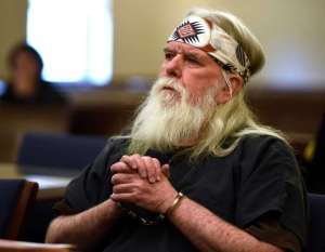 While in prison, Joe O'Hara let his hair grow long. He appears in court, in handcuffs, on one of the Bronfman-based charges.