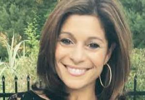 Debra Marino, grinning after selling Leonardo for $15,000