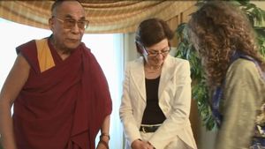 Nancy with the Dalai Lama and Sara Bronfman.