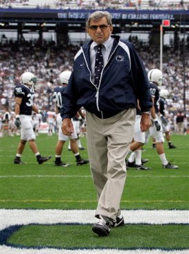 FILE - In this Sept. 6, 2008 file photo, Penn State coach Joe Paterno walks the field during warm-ups before their NCAA college football game against Oregon State at Beaver Stadium in State College, Pa. On Sunday, Jan. 22, 2012, family says Paterno, winningest coach in major college football, has died. (AP Photo/Carolyn Kaster, File)