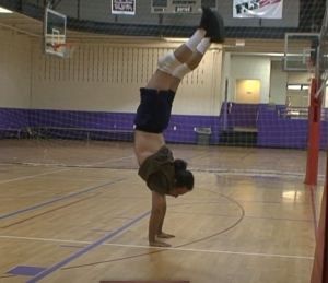At one time, Keith Raniere was in pretty good shape, Here he does a handstand on the volleyball court.