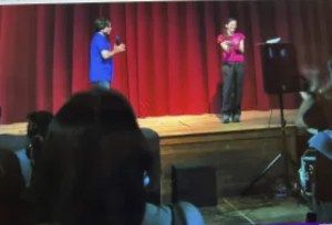 Keith Raniere and Clare Bronfman on stage at Vanguard Week.