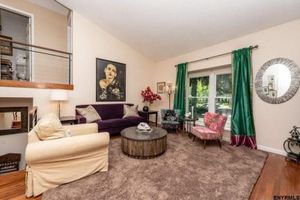 The old NXIVM gang are all putting up their homes for sale - there will be no more NXIVM Village in Clifton Park - and the days of "Camelot" are over for the female cast of characters that once centered their lives around a man named Keith Raniere and each other. This is the picture of the living room of Dani Padilla's former home in Clifton Park - where on many an evening she entertained her glorious Vanguard.