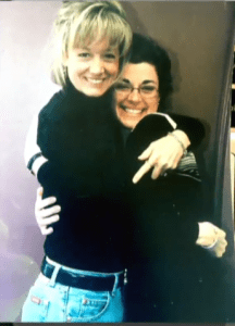 During happier days - Barbara Bouchey embraces Nancy Salzman.